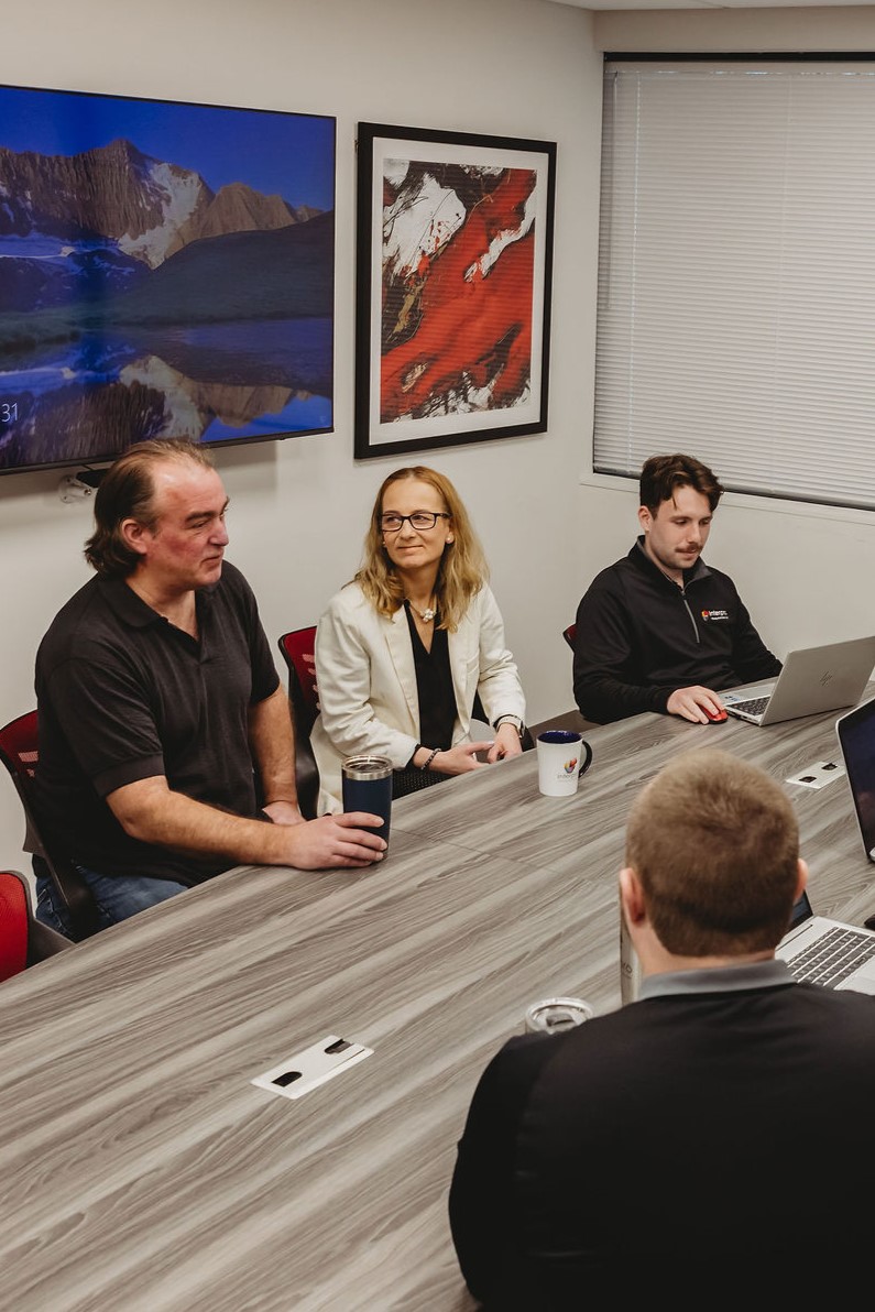 Interpro team conducting an AI translation strategy meeting