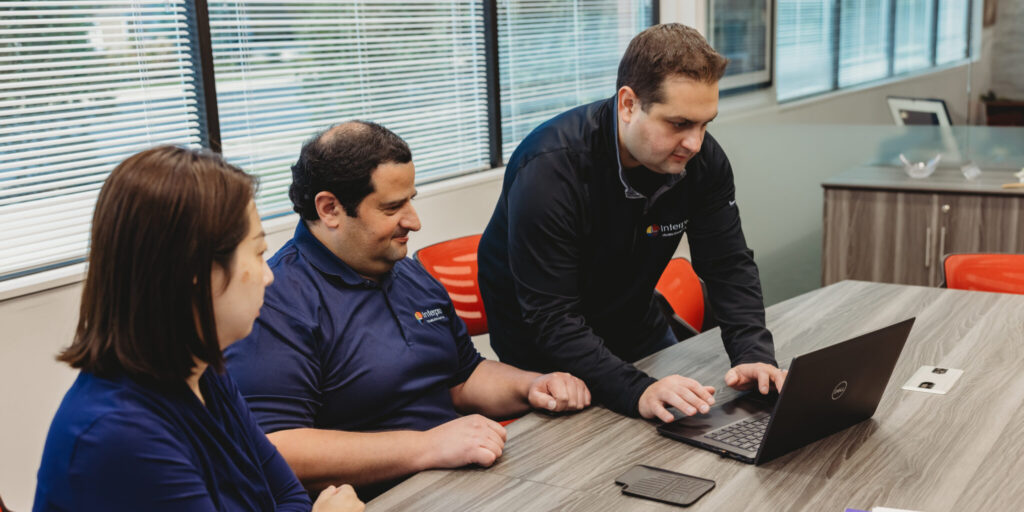 Interpro team collaborating on ethical and transparent AI translation policy guidelines.