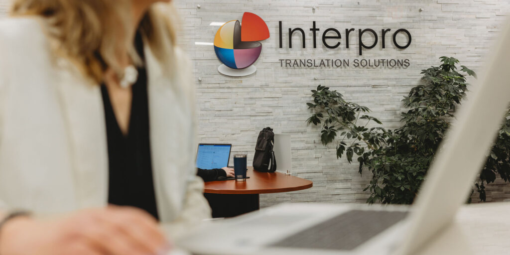 Interpro employee working on computer at Interpro Headquarters in the greater Chicago, IL area.