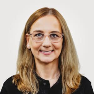 Maria Fagrelius, in project management at Interpro, smiling in a professional headshot wearing a black polo shirt.