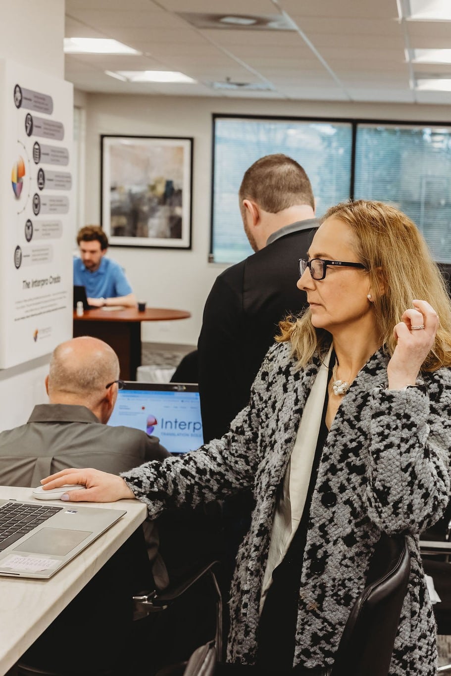 Interpro Employee Preparing Multilingual Web Meeting