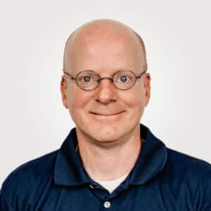 Patrick Pittsford, in sales at Interpro, smiling in a professional headshot wearing a black polo shirt.