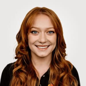 Stephanie Felt, in project management at Interpro, smiling in a professional headshot wearing a black polo shirt.