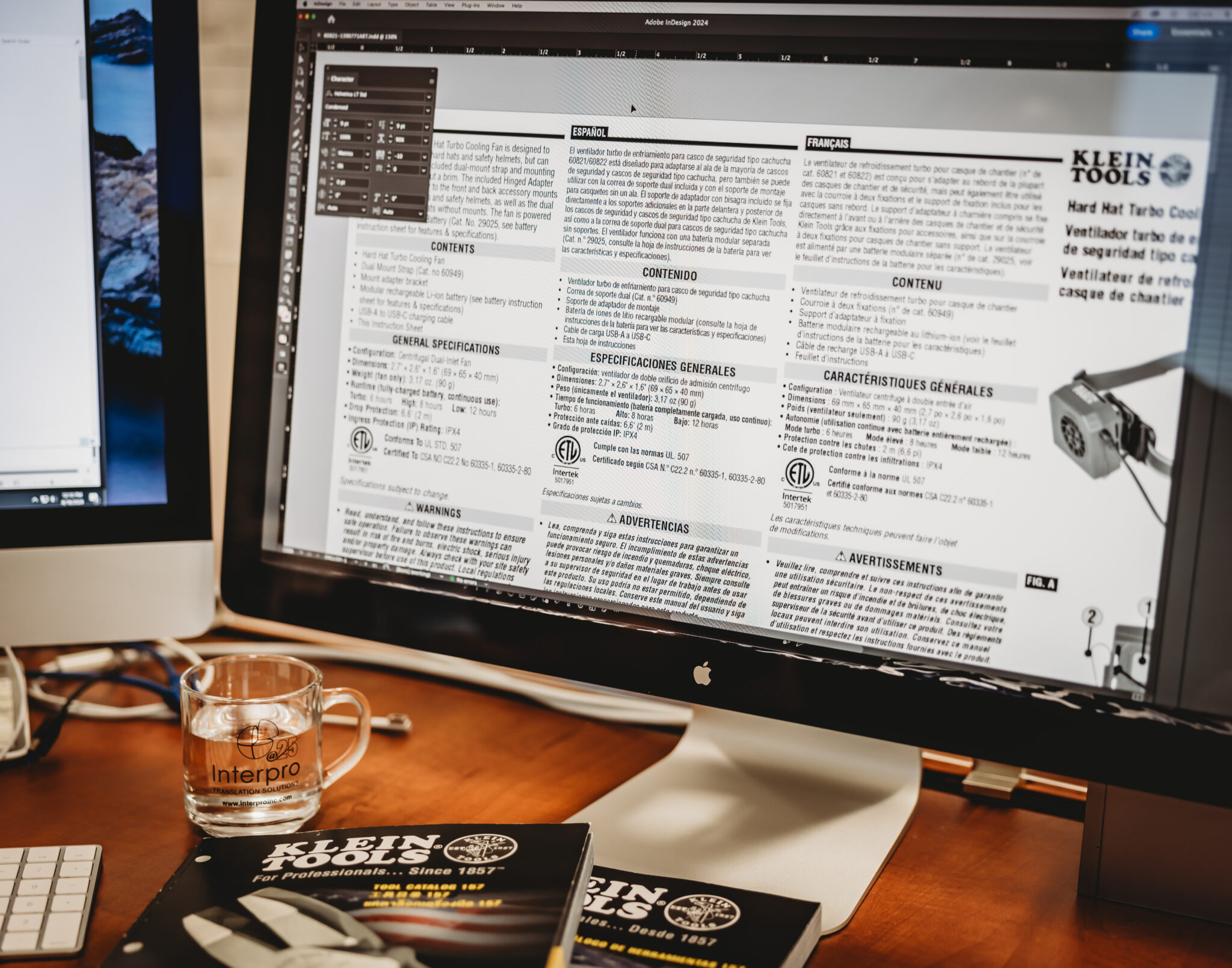 Close-up of technical manual being translated into Spanish and French on a monitor