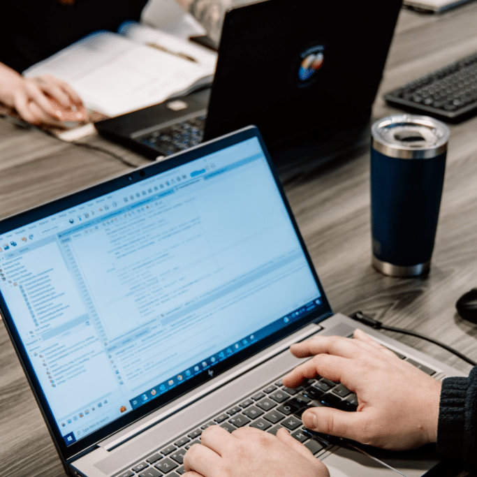 Interpro Translation Solutions translation process and localization engineers working on file preparation and technical setup for translation projects